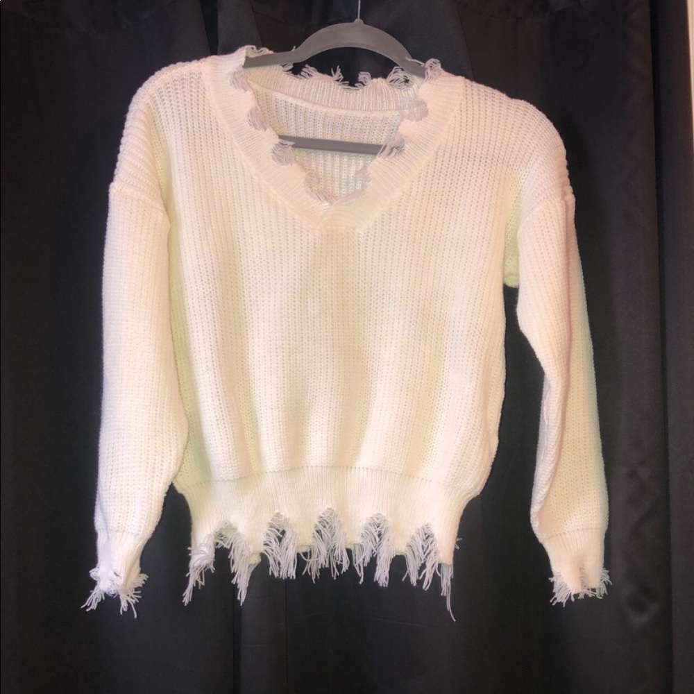 Distressed sweater